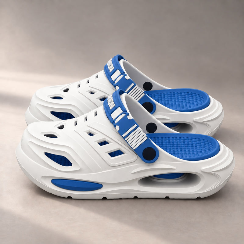 The Recovery Clog in white with blue details, side view