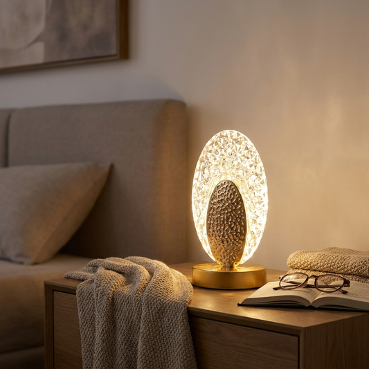 Sculpted table lamp on nightstand