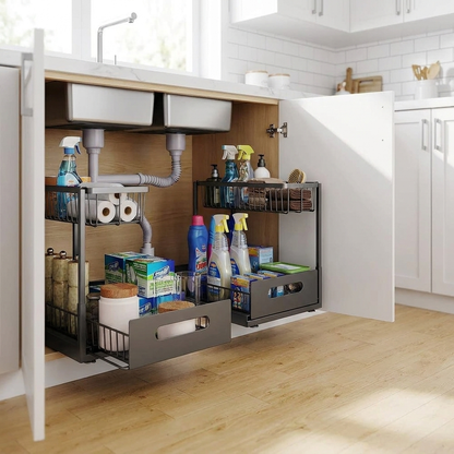 2 tier slide out under sink organizer holding cleaning supplies in kitchen cabinet