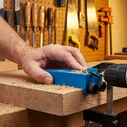 Woodworking angle drill guide in workshop